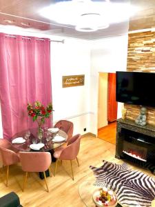 Appartements La suite romantique Jacuzzi,parking gratuit,centre : photos des chambres