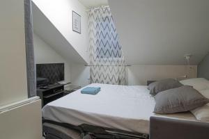 Appartements ZenBNB / Le Hutin / Hyper Centre / 2 min. du Tram : photos des chambres