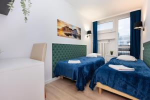 Unit Rooms Warszawa by Metro Rondo ONZ Short Rent idealne pokoje na nocleg w Warszawie