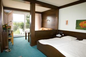 Hotels Hotel Restaurant Aux Trois Roses : photos des chambres