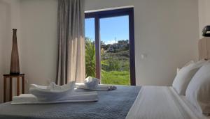 Family Junior Suite room in Odos Oneiron Tavronitis Bay
