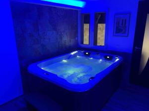 Appartements Cosy jacuzzi : photos des chambres