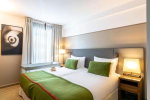 Appart'hotels Fraser Suites Paris La Defense : photos des chambres