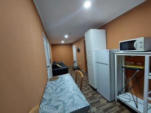 Appartements chambre tres confortable et acclimatee : photos des chambres