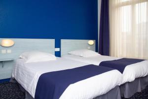 Hotels Le CESAR HOTEL : photos des chambres