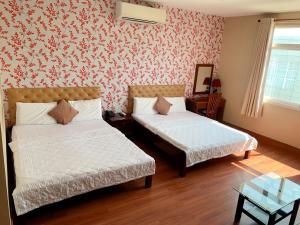 Phòng Deluxe 4 Người (Deluxe Quadruple Room)