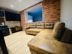 Appartements Un moment hors du temps - Jacuzzi - Sauna - Billard - Parking : photos des chambres