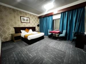 Family Room with Sea View room in Mermaid Beach Hotel LLC