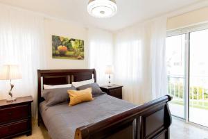 Pristine 4BR Beachfront Getaway with Pool & Rooftop