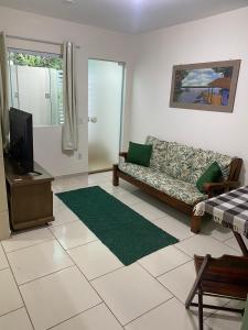 Casa aconchegante e charmosa à 6 min da Praia - Ar condicionado - WIFI 600MB - Netflix - Globoplay - Cozinha Completa