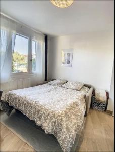 Appartements IDF03 Superbe appart cosy aeroport CDG wifi 4 pers : photos des chambres