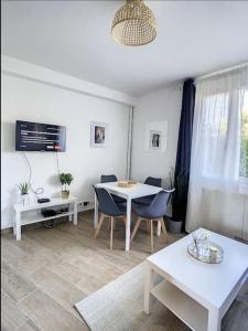 Appartements IDF03 Superbe appart cosy aeroport CDG wifi 4 pers : photos des chambres