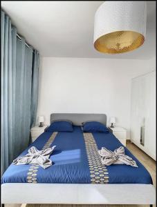 Appartements IDF04 Superbe appart cosy aeroport CDG wifi 4 pers : photos des chambres