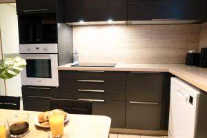 Appartements M.A.H 2 Le calme en hyper centre magnifique : photos des chambres