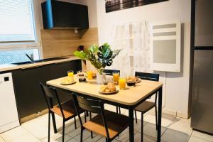 Appartements M.A.H 2 Le calme en hyper centre magnifique : photos des chambres