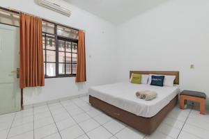 Urbanview Hotel Pondok Kurnia Cijagra Bandung by RedDoorz