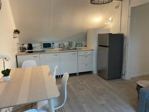 Appartements 3 pieces centre ville ville pittoresques parking gratuit a 5 minutes a pied : photos des chambres
