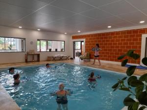 Hotels Les Lodges du golf de la Marterie : photos des chambres