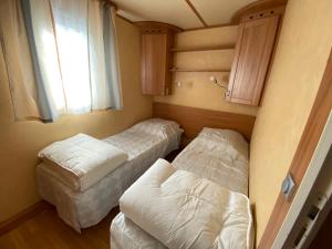 Villas Charmant Mobile-home 5 personnes sur terrain prive a 200 m de la plage - PADRIG : photos des chambres