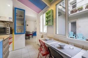 Appartements Les Volets Bleus T3 de 80 m2 patio privatif : photos des chambres