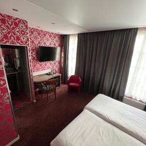 Hotels Le Grand Hotel : photos des chambres