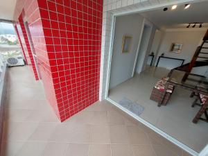Apartamento a 50m praia maitinga, wifi, churrasqueira na varanda