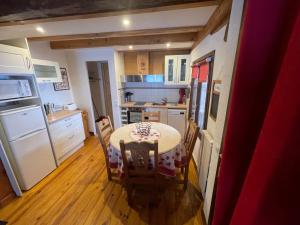 Appartements Le REFUGE veritable cocon avec Cheminee : photos des chambres