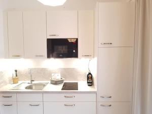 Appartment BERGE byTILLY - Ruhiges Waldrand-Refugium mit Balkon, Gartenblick & Nähe zum Wörthersee