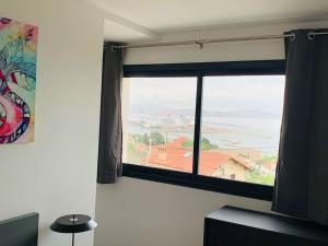Appartements Magnifique vue sur la mer ... : photos des chambres