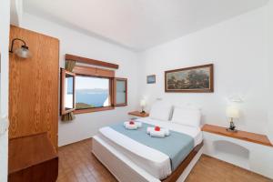 Two-Bedroom Apartment (4 Adults) room in Kounenos Apartments