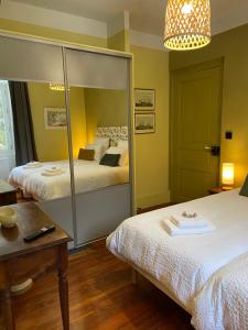 B&B / Chambres d'hotes LE CLOS DU TULIPIER : photos des chambres