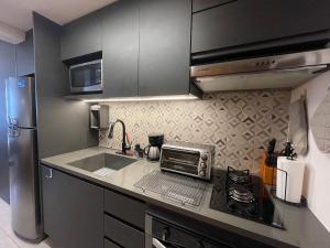 Ar-condicionado e TV próximo à Avenida Paulista