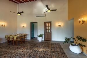 SaffronStays Mariposa Rio- 2BR Goan-style riverside pool villa with machan, garden & bonfire near Mumbai