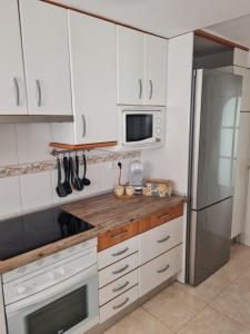 Gran terraza con vistas al mar y piscina