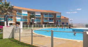 Appartements Appart Frontignan sur la plage, piscine, wifi, tv, Netflix : photos des chambres