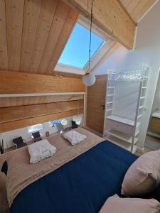 Appartements Duplex type chalet dans le Jura : photos des chambres