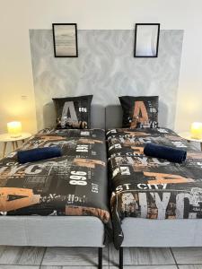 Appartements Le cosy en coeur de ville : photos des chambres