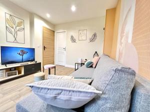 Appartements L'odyssee, a 5 min de la gare ~ Fibre + parking : photos des chambres