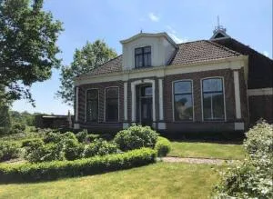 Statige boerderijwoning met vrij uitzicht en tuin - Oostermeer