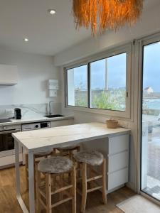 Appartements Casa Nomad - appartement cozy les pieds dans l'eau : photos des chambres