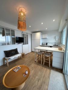 Appartements Casa Nomad - appartement cozy les pieds dans l'eau : photos des chambres