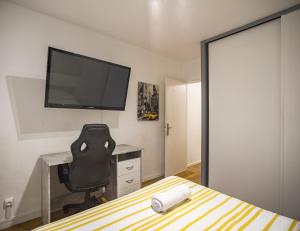 Appartements Le Spacieux - 6 personnes - Parking Gratuit : photos des chambres