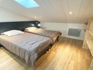 Appartements L'appart' Le Bois Flotte : photos des chambres