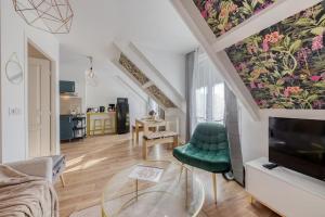 Appartements Duplex les Oiseaux du Verger, au coeur de la ville : photos des chambres