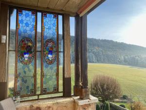 Maisons d'hotes Clos de Mont July, chambres avec vue et terrasse dans demeure historique : photos des chambres