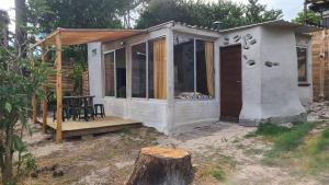 Casita entre dunas al son del mar