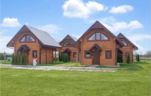 Awesome home in Jezierzany with Outdoor swimming pool Jacuzzi and 2 Bedrooms