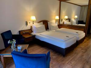 Triple Room with Balcony room in Riessersee Hotel