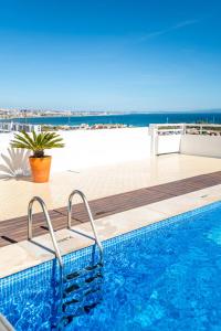 Amazing Sea View Apt with Pool Cascais - atjoanas