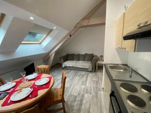 Appartements Le cosy de la vologne : photos des chambres